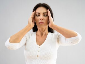 woman feeling dizzy