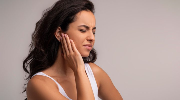 woman with ear pain