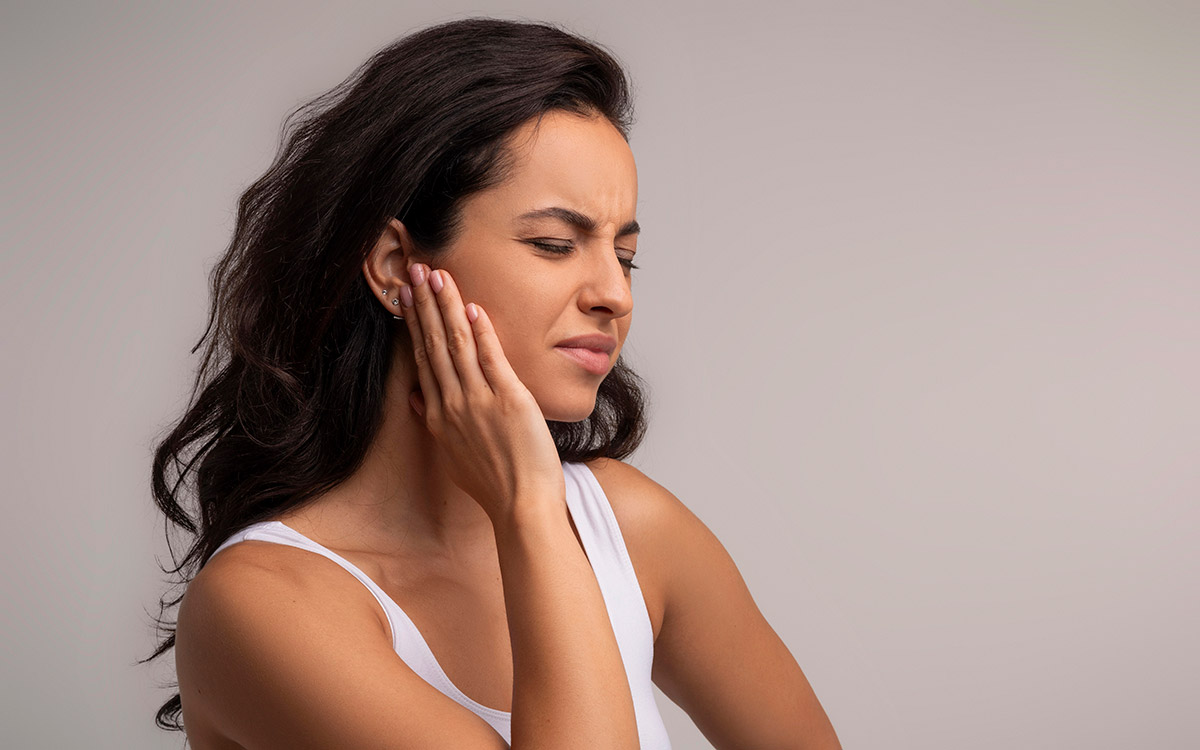 woman with ear pain