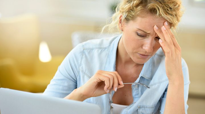 woman at work with fatigue