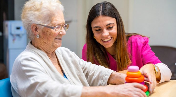 woman playing with senior a game