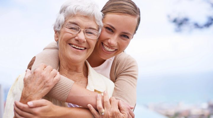 woman with mother smiling
