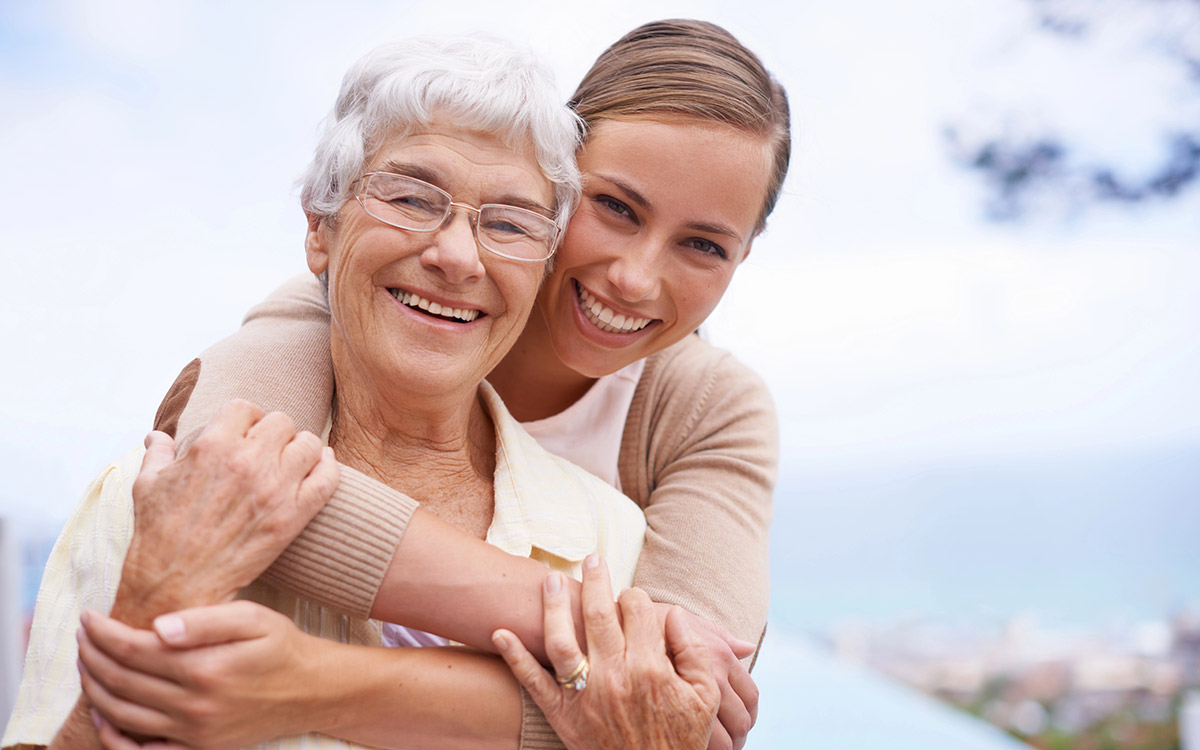 woman with mother smiling