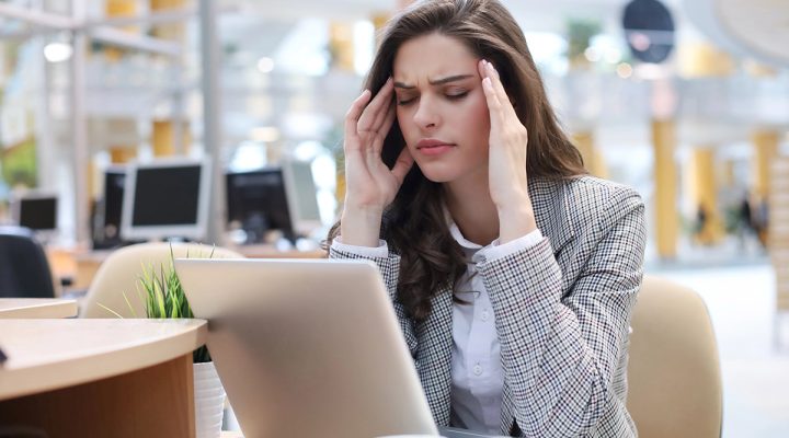 fatigue woman trying to work