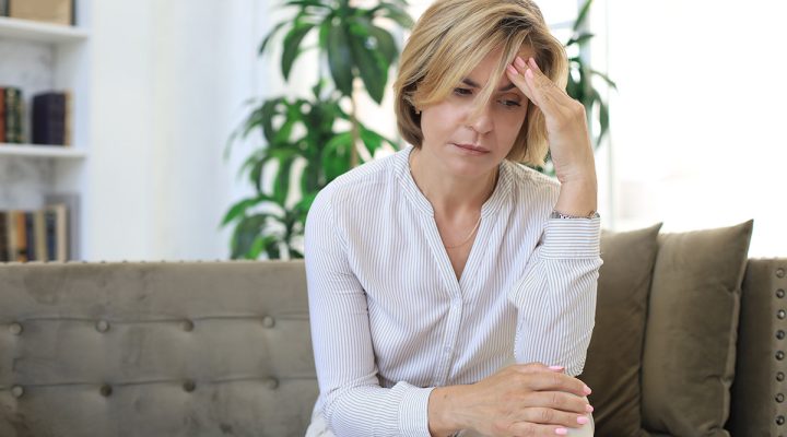 woman at home thinking