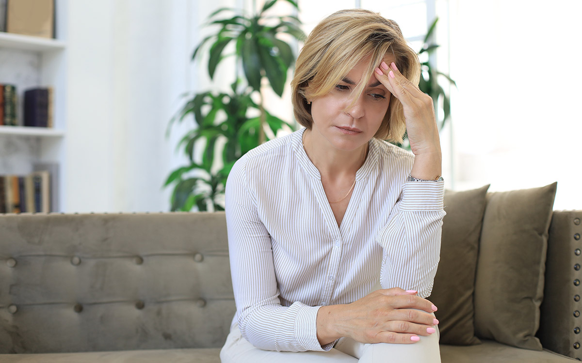 woman at home thinking