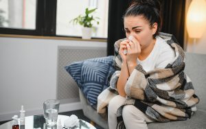 woman sick not feeling well