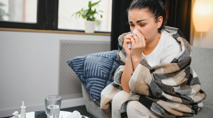 woman sick not feeling well