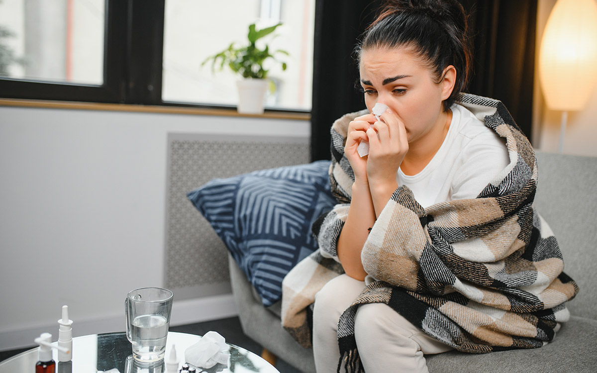 woman sick not feeling well