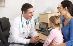 pediatric doctor talking with family