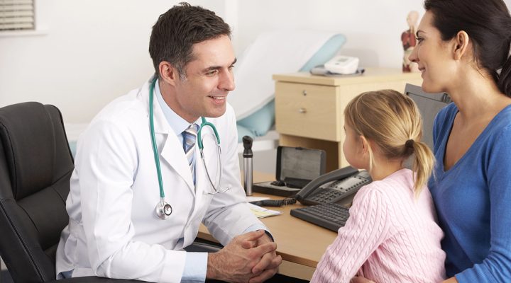 pediatric doctor talking with family