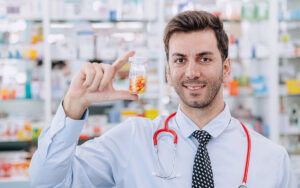 Pharmacist holding compounded medicine
