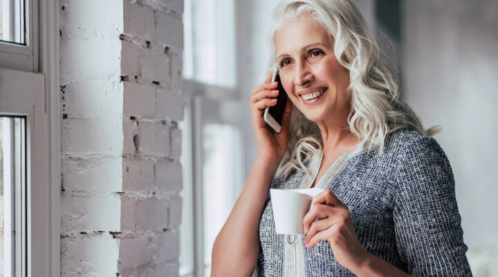 Senior woman at home drinking tea