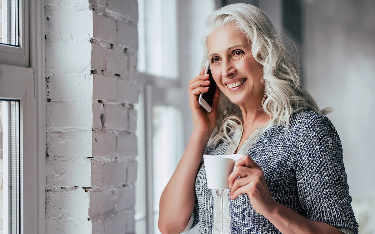 Senior woman at home drinking tea