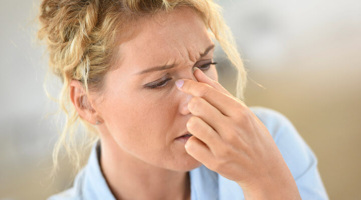 Woman suffering sinusitis