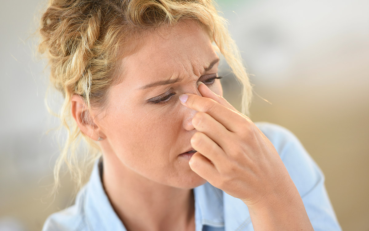 Woman suffering sinusitis