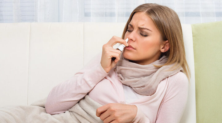 woman using a compounded nasal spray