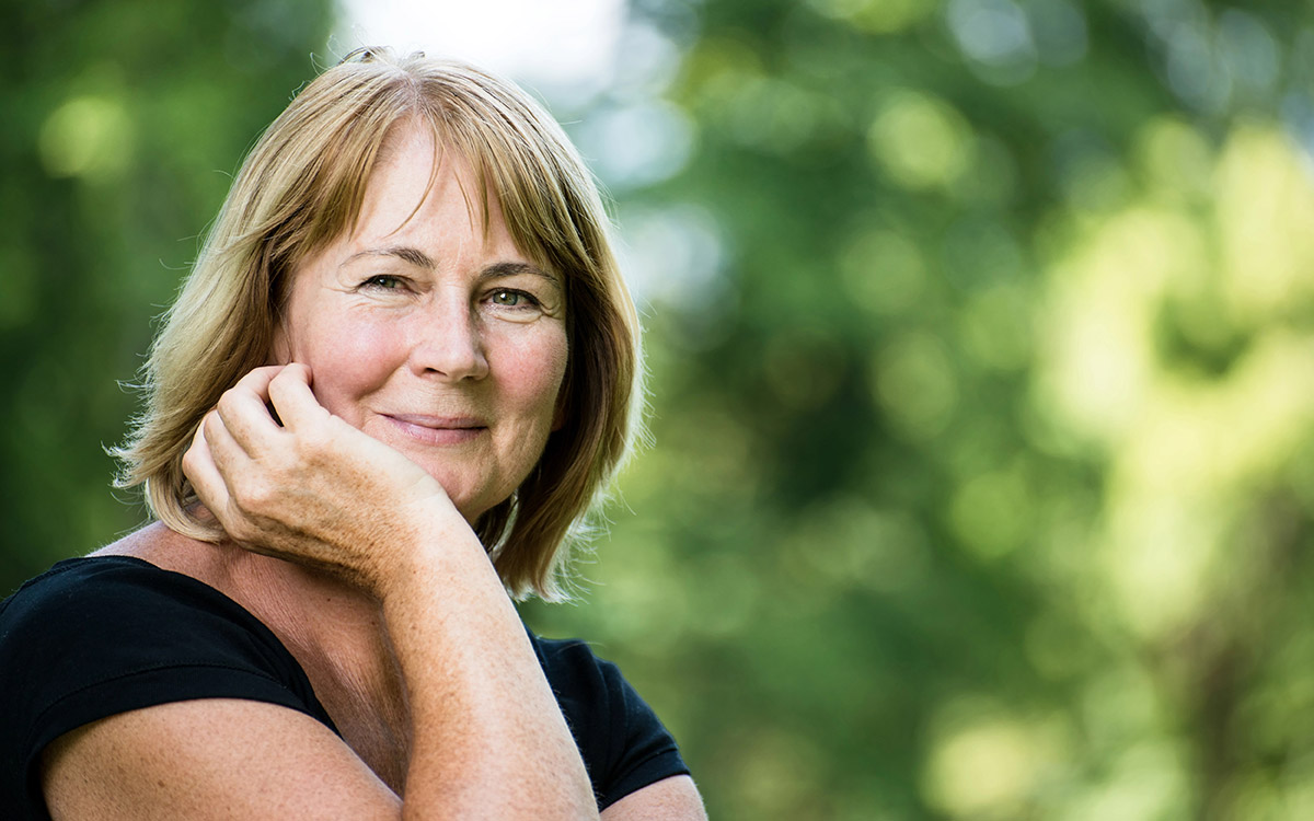 healthy senior woman smiling at home